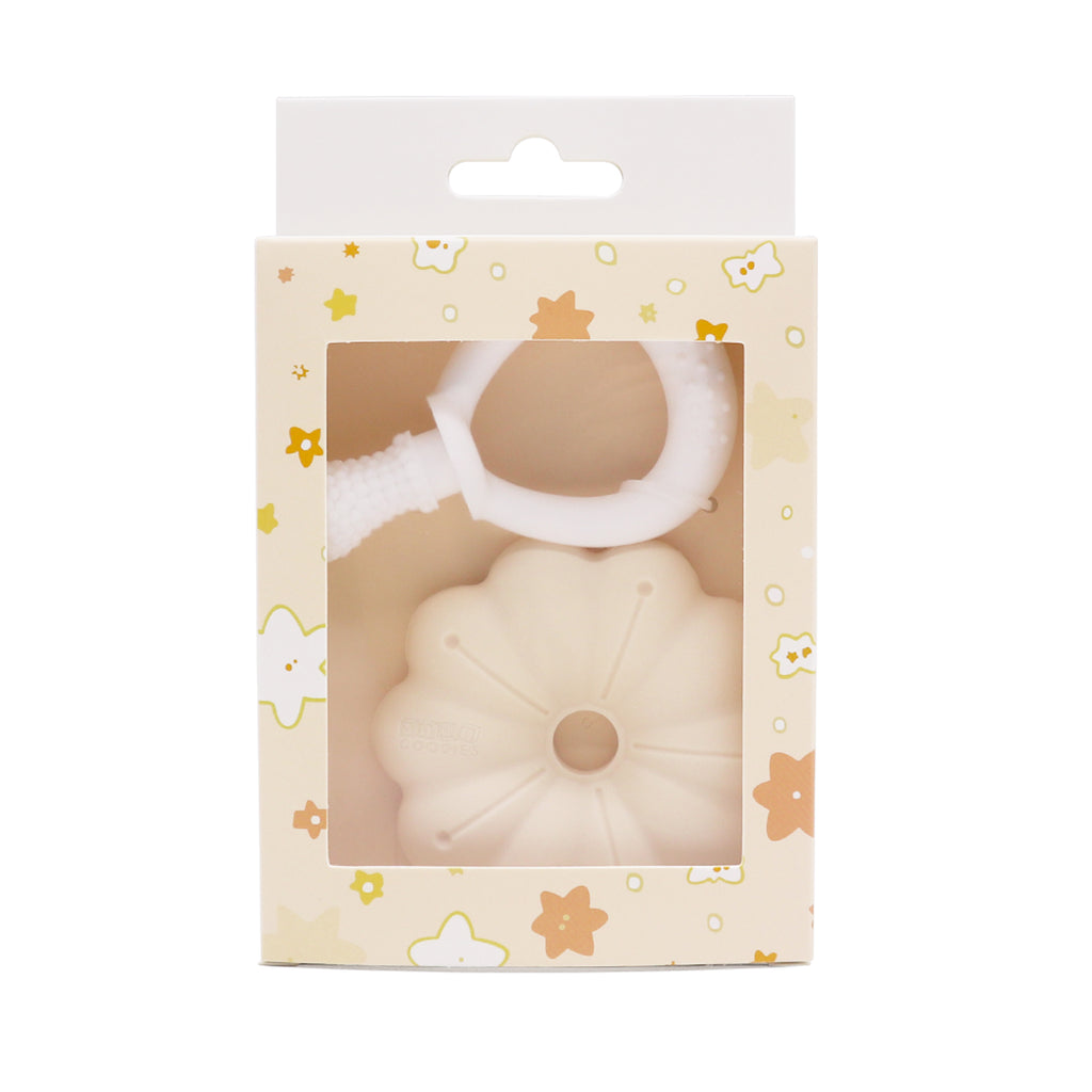 Siliconen bloem bijtring gepresenteerd als ideaal babycadeau.